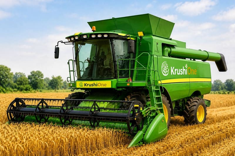 A combine harvester working in a field of ripe wheat